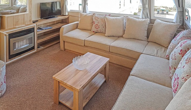 Contemporary 12ft-wide caravan with one double and one twin.