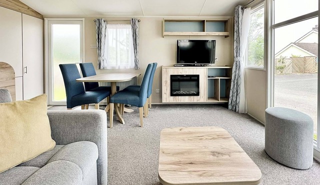 Contemporary 12ft-wide caravan with one double and one twin.