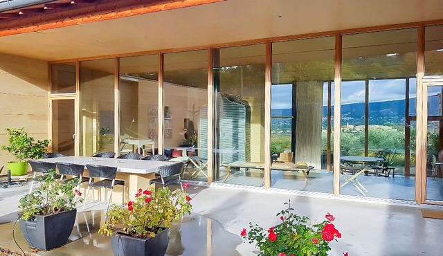 Contemporary 4-bed house with infinity pool and countryside views.