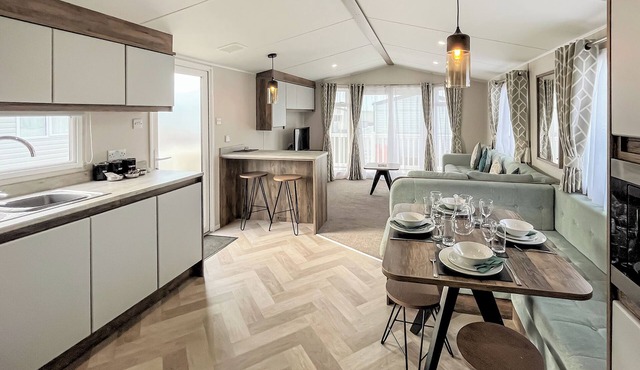 Contemporary caravan with one double and one twin.