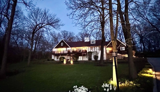 Contemporary Classic Mansion on .8 acred Wooded Estate with Private Lake.