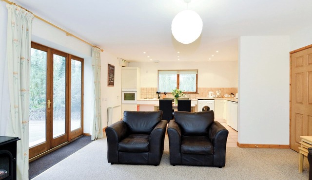 Contemporary cottage style single storey lodge.