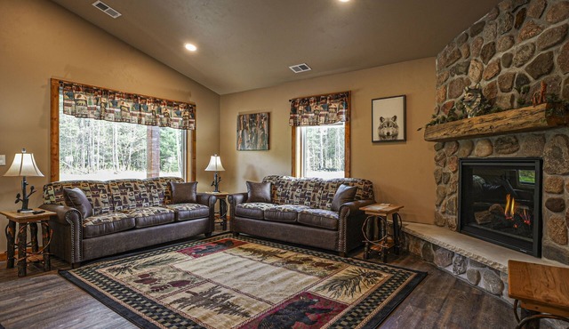 Contemporary dog-friendly cabins with hot tub, fireplaces, patios, & game room