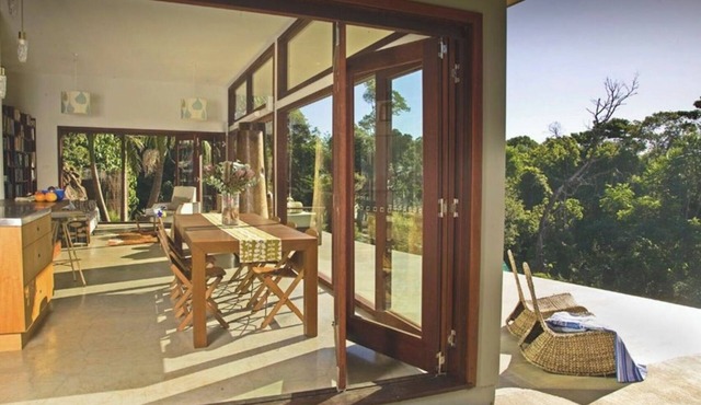 Contemporary eco house with plunge pool overlooking the rainforest