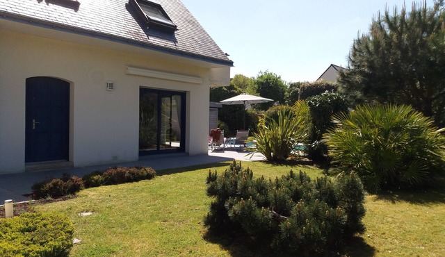 Contemporary family home with garden and heated pool, near beach