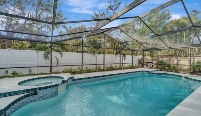 Contemporary Home with heated LARGE POOL and SPA