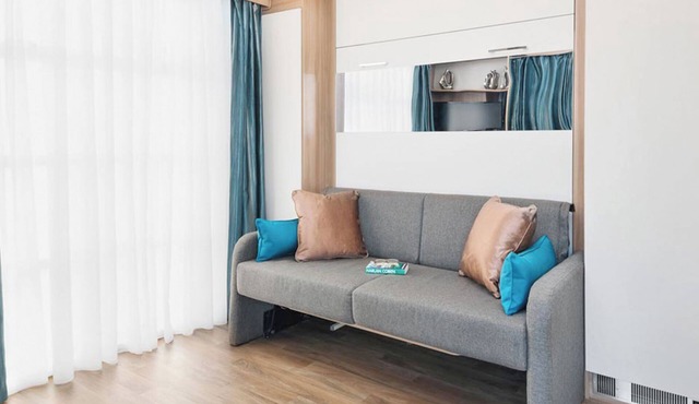 Contemporary mini pod with one double pull-out bed and en suite shower and W.