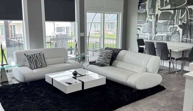 Contemporary & spacious 5-bedroom home with pool table & foosball in Urbandale!