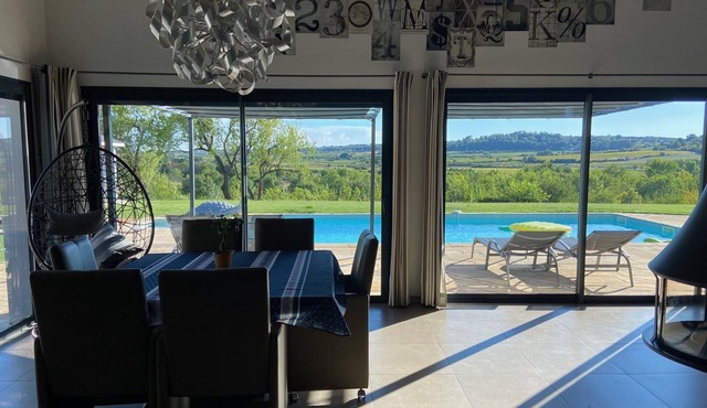 Contemporary upscale villa, heated pool with jacuzzi. Breathtaking view