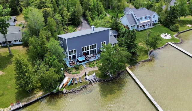 Contemporary Waterfront Home on North Lake Leelanau with Hot Tub and Dock