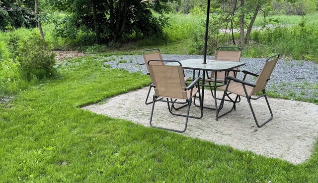 Convenient Campsite W/fifth wheel camper, Creek Front.