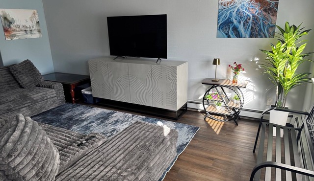 Convenient South Anchorage townhome with Heated Garage, fitness & yard areas.