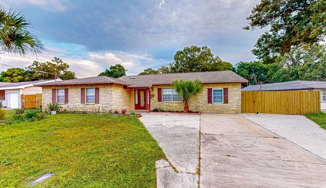 Conveniently located home with private pool, patio, foosball, & private W/D