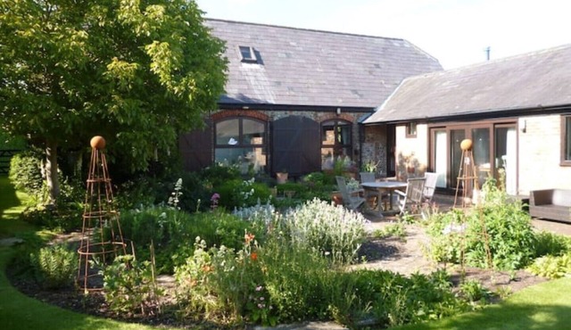 Converted Barn at the foot of the South Downs in four acres of gardens