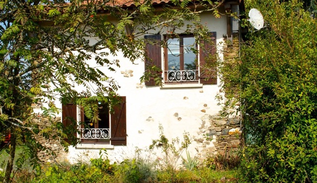 Converted stone gite in an orchard, The Piggery.