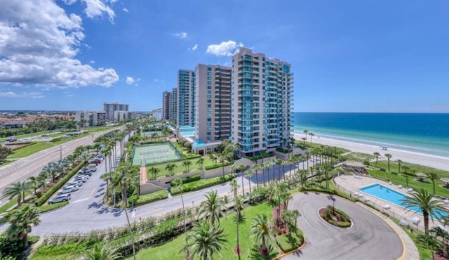 Corner condo overlooking the beach and bay. Secluded beach.
