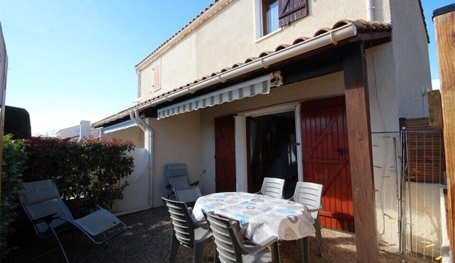 Corner house located in secured residence with pool, 2 bedrooms upstairs, WIFI, for 5 persons, at.
