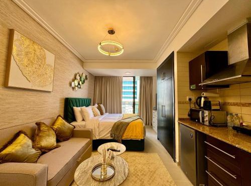 Cosmos Living Sleek and Stylish Studio with Balcony