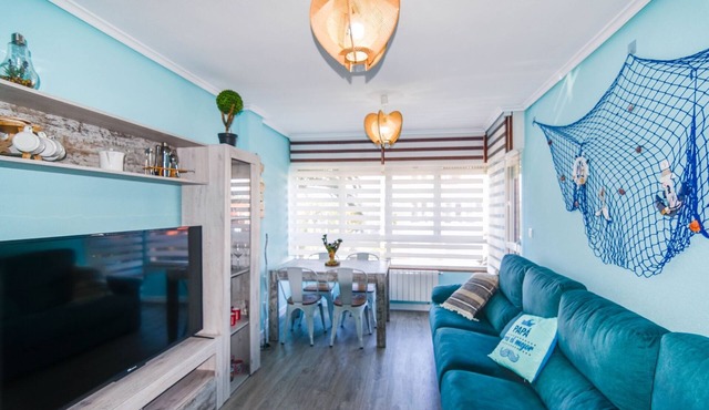 Cosy and comfortable flat with swimming pool and paddle tennis court.
