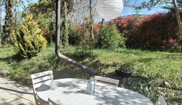 Cosy apartment with terrace and garden view 3 minutes from the lake