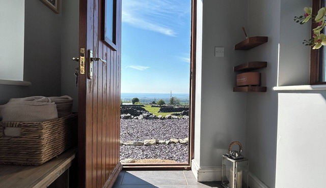 Cosy cottage enjoying a secluded spot with stunning views