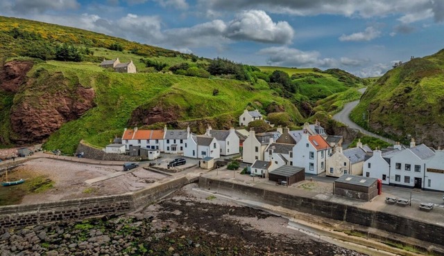 Cosy fisherman's cottage on the Pennan seafront.