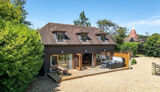 cosy lodge with hot tub on a working farm