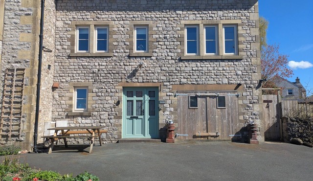 Cosy yet spacious property with private parking, close to the village centre.