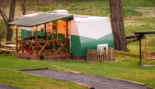 Cotch under a sugar maple tree w/firepit, swing and outdoor shower