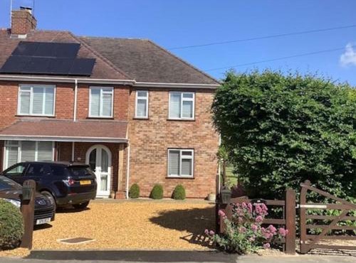 Cotswold edge guest suite with Broadway Hill view