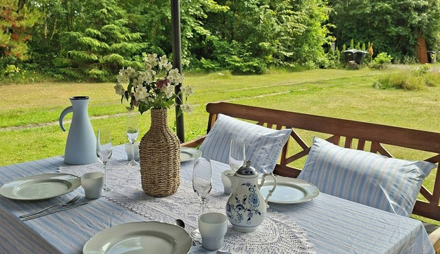Cottage at forest edge with hot tub near Hals
