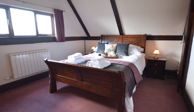 Cottage attached to Moated Farmhouse centrally situated in Suffolk