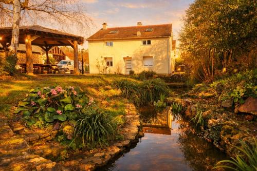 Cottage au bord de bassin