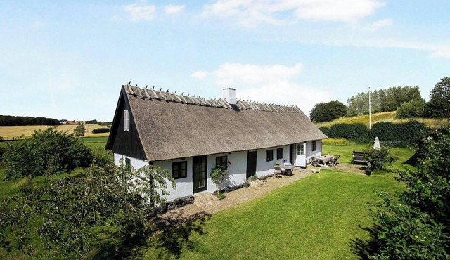 Cottage charm near Svebølle amidst fields