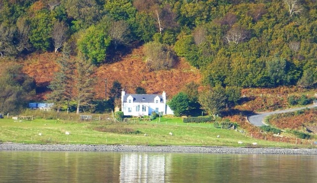Cottage Close To Sea Shore With Sea and Mountain Views, 8 miles from Portree.