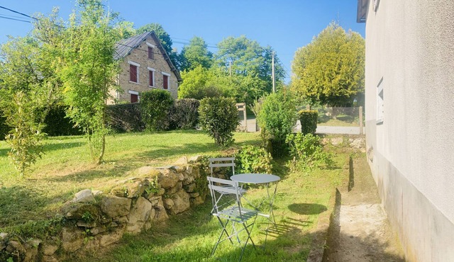 Cottage In the Shadow of the Tulip Tree