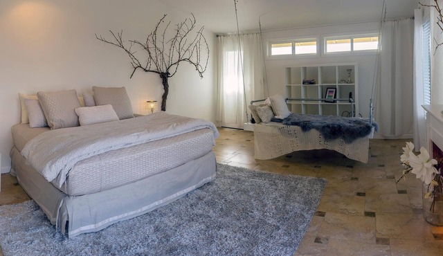 Cottage offers a sectional sofa, chef's kitchen and open floor plan.