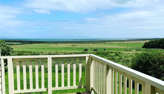 Cottage on orchard acreage with ocean views