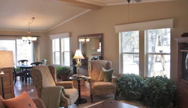 COTTAGE ON THE CREEK VACATION RENTAL. Sleeps 4. Beautiful views. Riverside deck. Fishing.