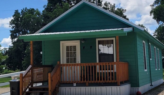 Cottage tucked in back of orchard with full kitchen and lake access!