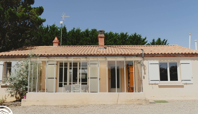 Cottage with games and terrace in La Guittière