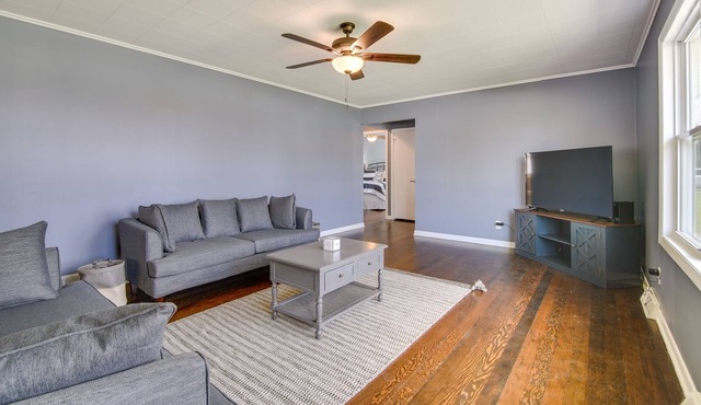 Cottage w/ Sunroom & Fire Pit, Walk to Lake!