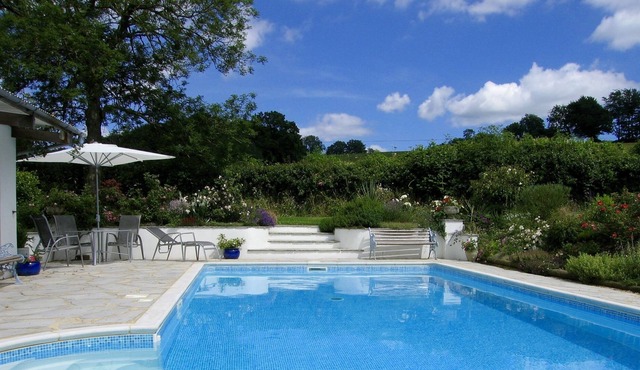 Cottage with Outdoor Pool in Gardens. Peaceful Location with Great Views.