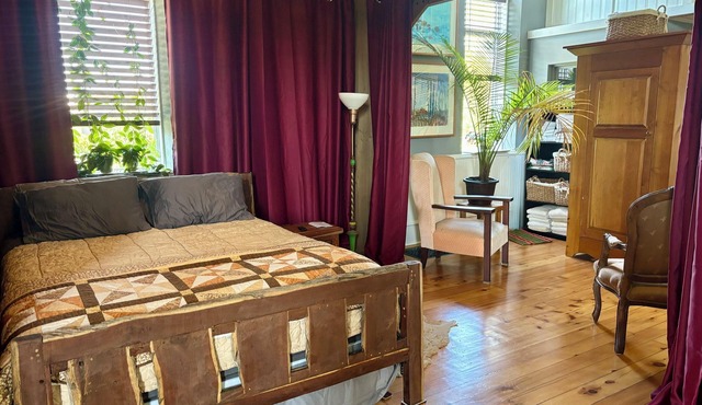 Country church converted into comfy, elegant escape — outdoor entertainment area