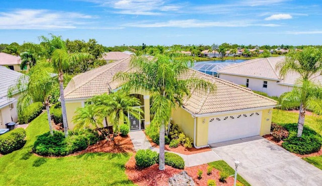 Country club retreat with private pool, water views, on-site golf, & gym