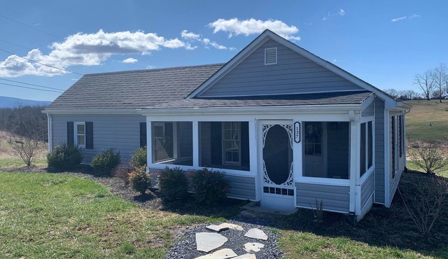 Country cottage beside stocked pond on 40 acres and Blue ridge Mountain View
