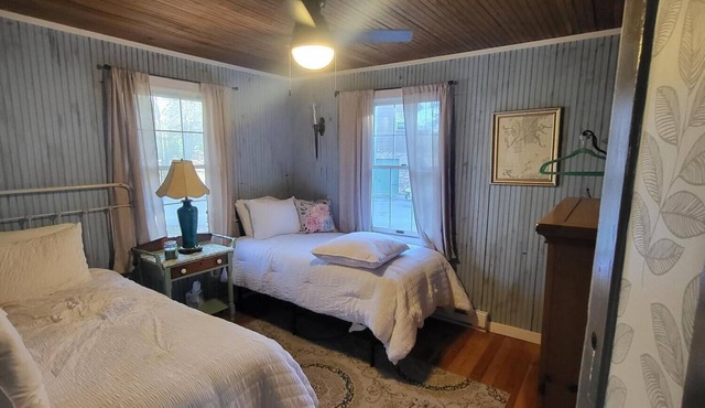 Country cottage on historic property with lake, walking trails close to town.