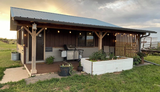 Country cozy cabin on a real working ranch! Located just 2 miles off I-90.