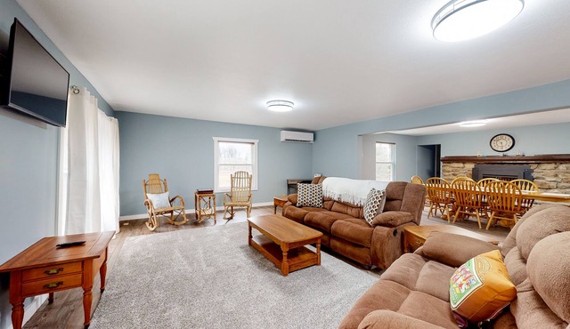 Country escape on 43 acres with boat launch access, a firepit, grill, & W/D