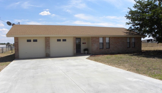 Country Haven has 3 bedrooms and 2 baths. A kitchen, living room and dining.